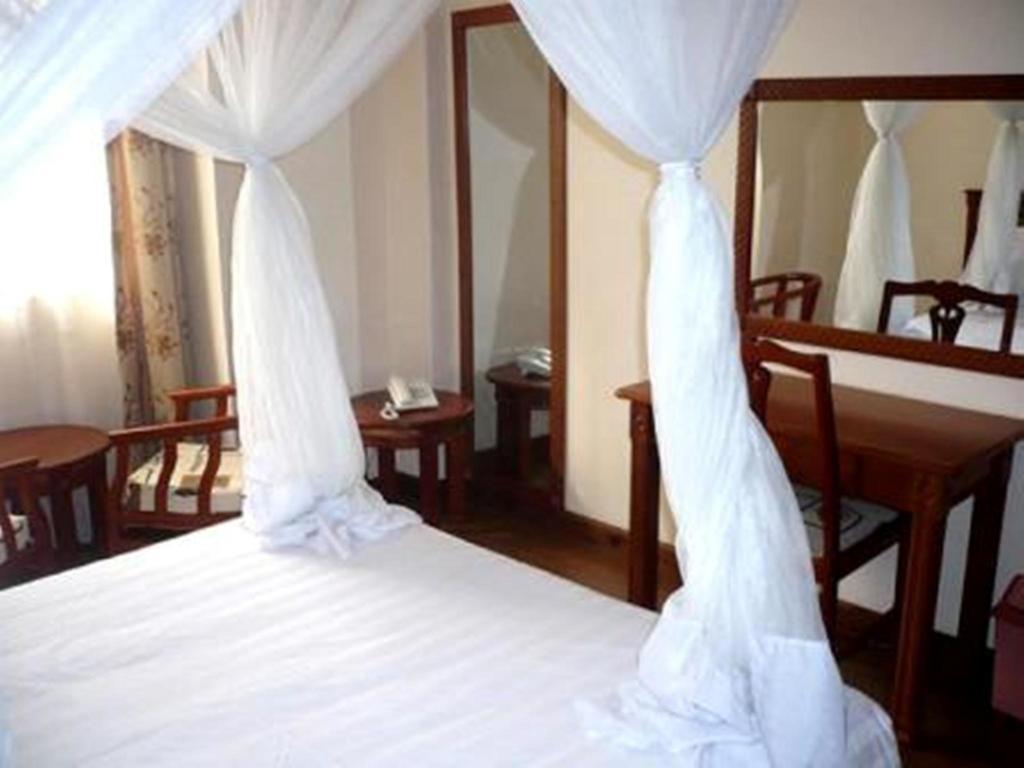 Arusha Tourist Inn Hotel Szoba fotó