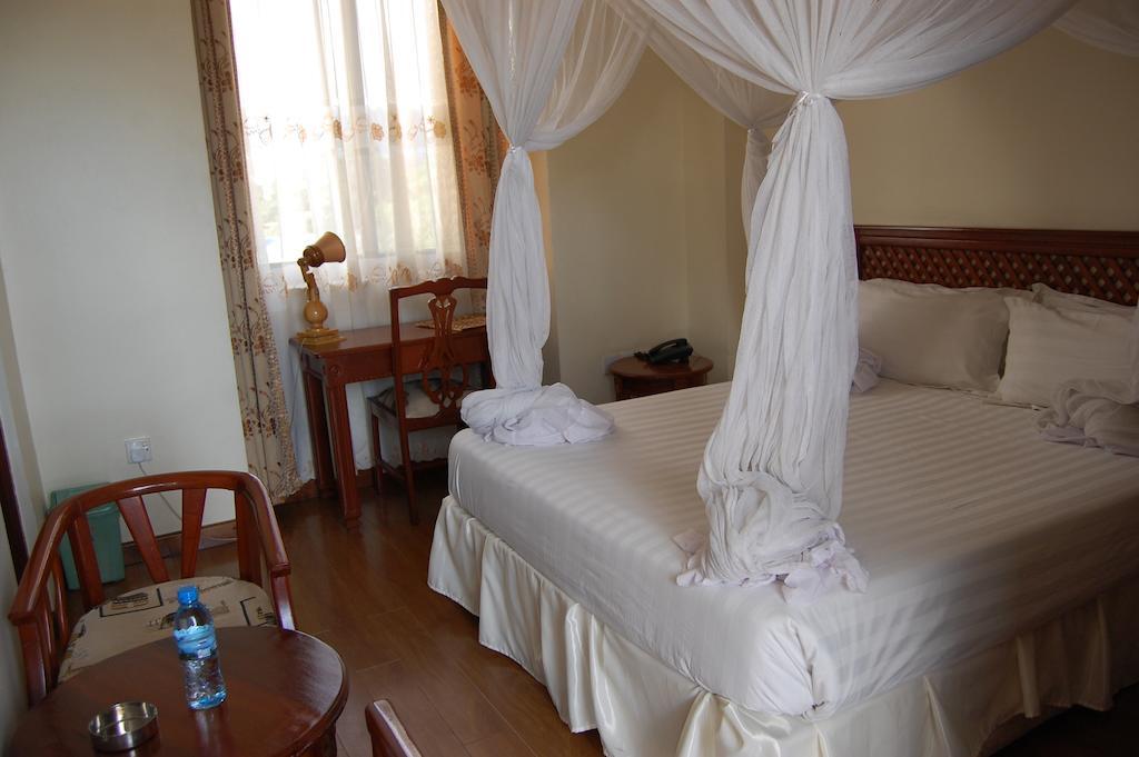 Arusha Tourist Inn Hotel Szoba fotó