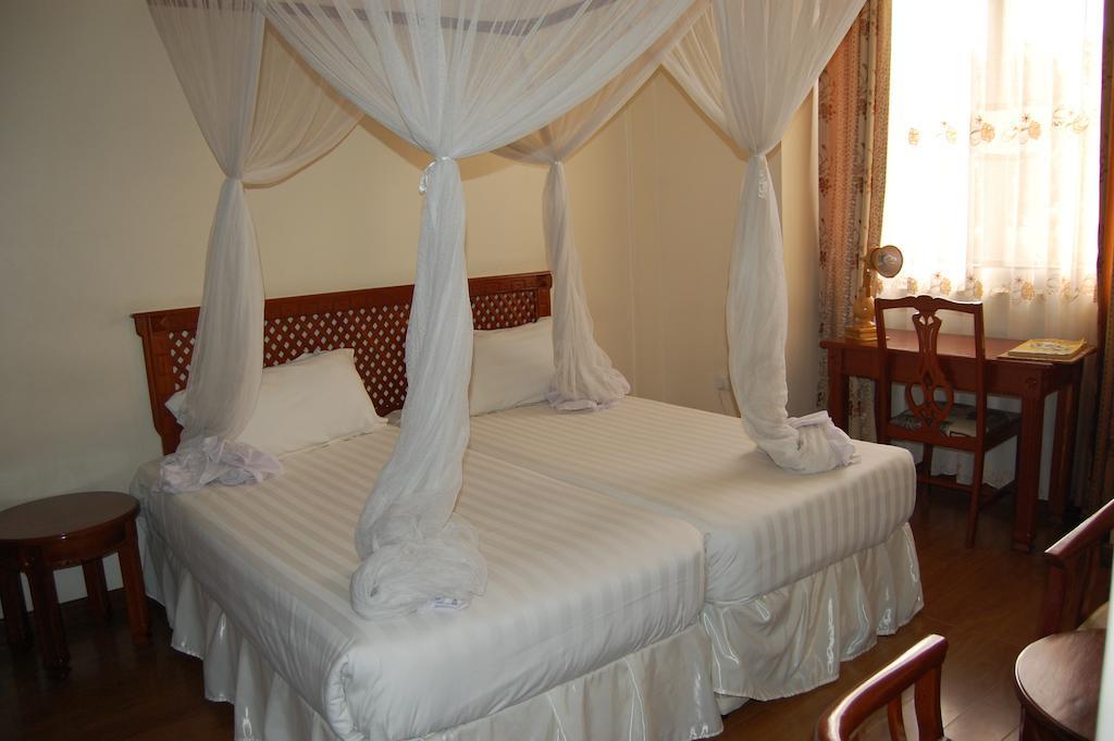 Arusha Tourist Inn Hotel Szoba fotó